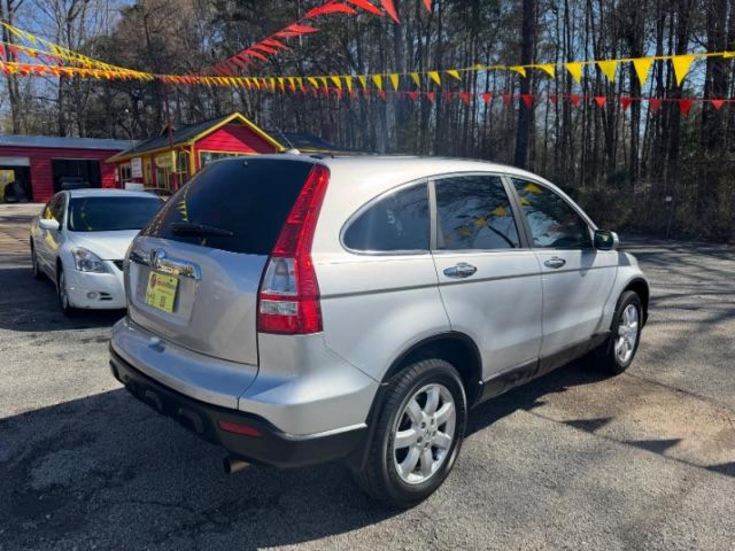 2009 Silver Honda CR-V EX-L 2WD 5-Speed AT (5J6RE38749L) with an 2.4L L4 DOHC 16V engine, 5-Speed Automatic transmission, located at 1806 Veterans Memorial Hwy SW, Austell, GA, 30168, (770) 944-9558, 33.817959, -84.606987 - Photo#2
