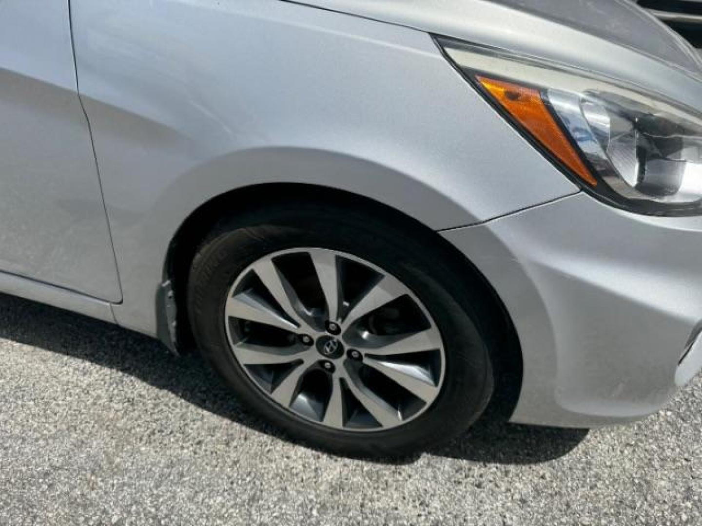 2017 Gray Hyundai Accent SE 4-Door 6A (KMHCT4AE4HU) with an 1.6L L4 DOHC 16V engine, 6-Speed Automatic transmission, located at 1806 Veterans Memorial Hwy SW, Austell, GA, 30168, (770) 944-9558, 33.817959, -84.606987 - Photo#18