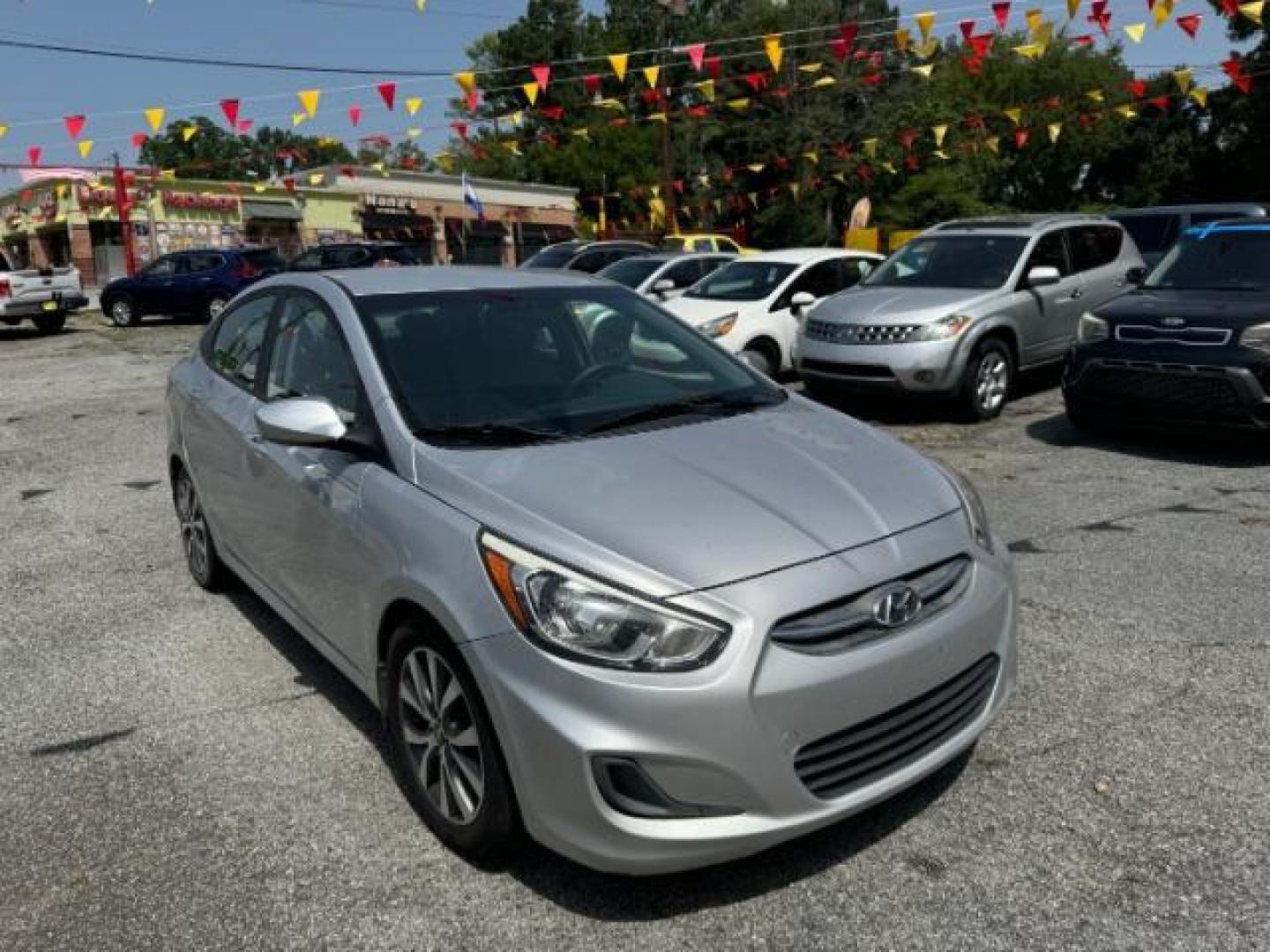 2017 Gray Hyundai Accent SE 4-Door 6A (KMHCT4AE4HU) with an 1.6L L4 DOHC 16V engine, 6-Speed Automatic transmission, located at 1806 Veterans Memorial Hwy SW, Austell, GA, 30168, (770) 944-9558, 33.817959, -84.606987 - Photo#2
