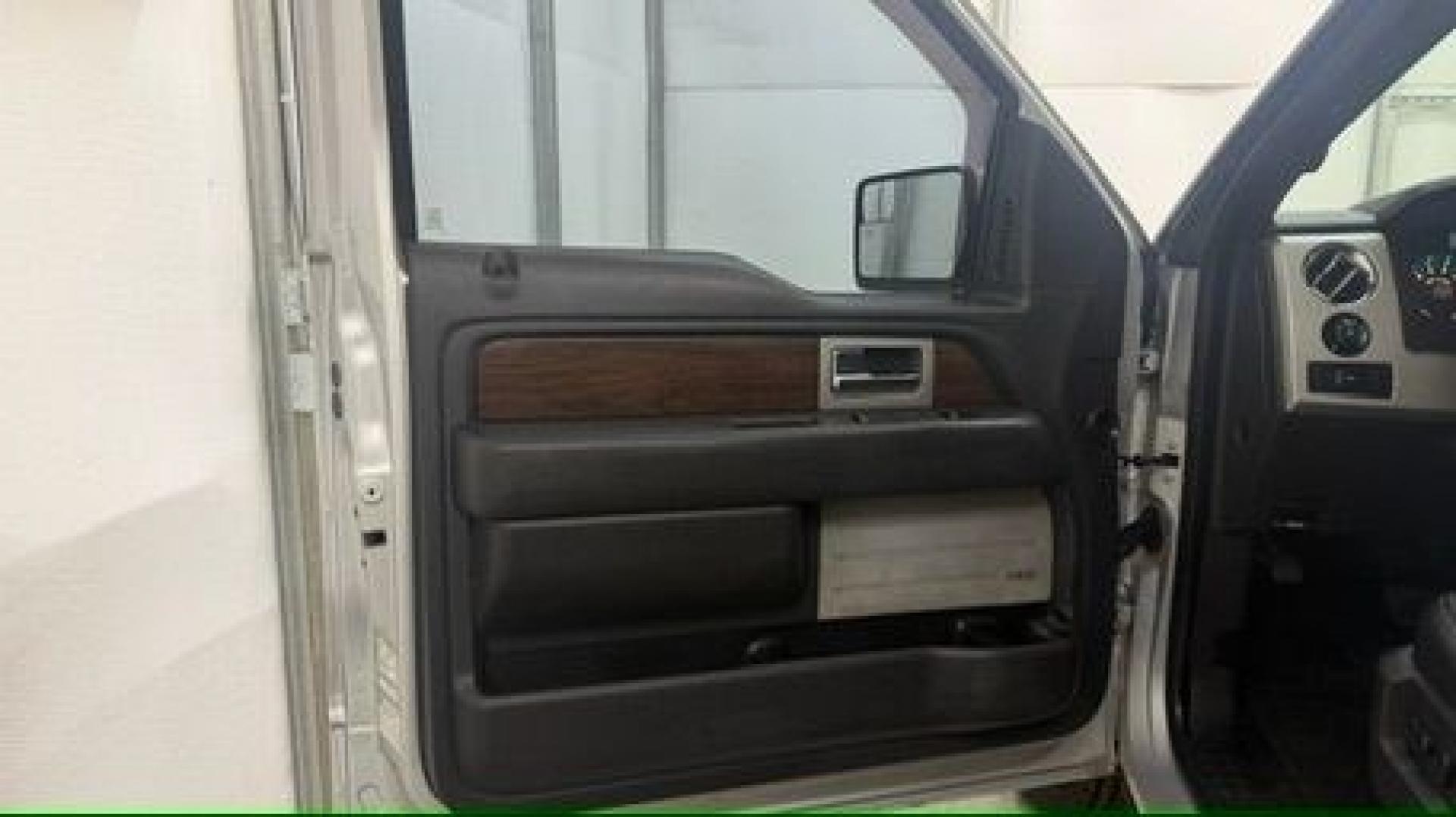 2014 Silver Ford F-150 LARIAT (1FTFW1CT0EK) with an 3.5L V6 TURBO engine, 6-Speed Automatic transmission, located at 1806 Veterans Memorial Hwy SW, Austell, GA, 30168, (770) 944-9558, 33.817959, -84.606987- Photo#2