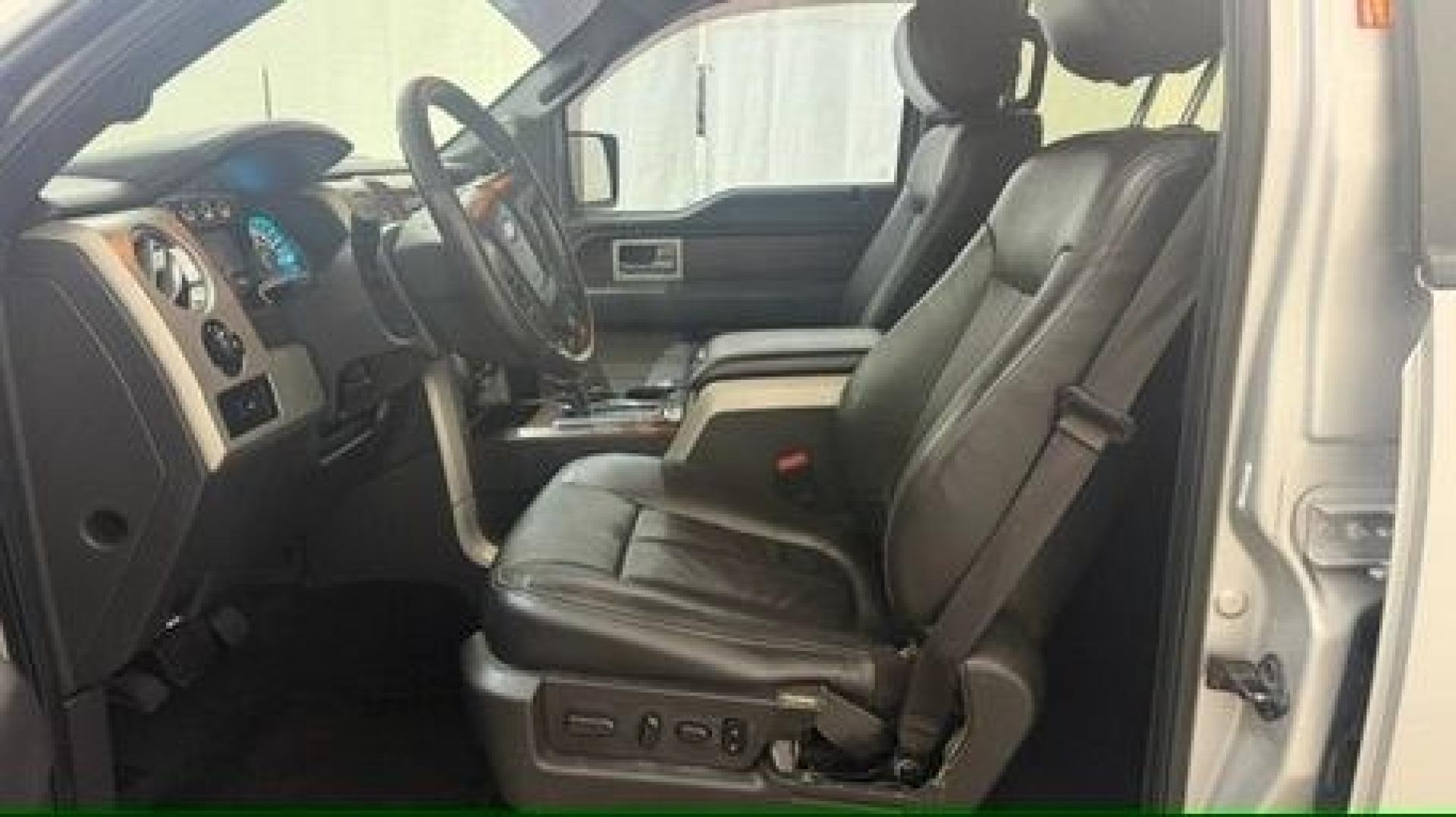 2014 Silver Ford F-150 LARIAT (1FTFW1CT0EK) with an 3.5L V6 TURBO engine, 6-Speed Automatic transmission, located at 1806 Veterans Memorial Hwy SW, Austell, GA, 30168, (770) 944-9558, 33.817959, -84.606987- Photo#3