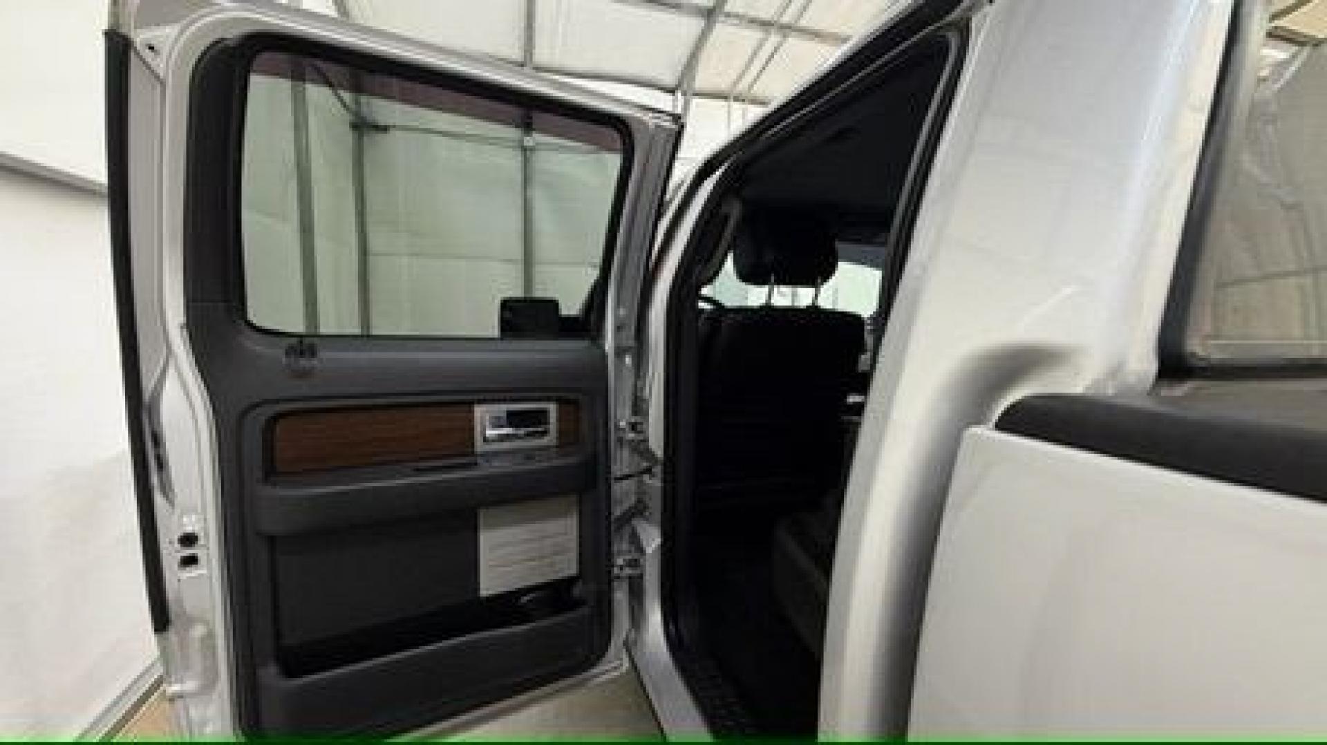 2014 Silver Ford F-150 LARIAT (1FTFW1CT0EK) with an 3.5L V6 TURBO engine, 6-Speed Automatic transmission, located at 1806 Veterans Memorial Hwy SW, Austell, GA, 30168, (770) 944-9558, 33.817959, -84.606987- Photo#4