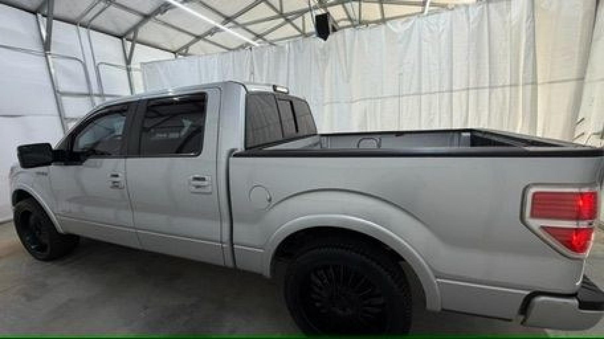 2014 Silver Ford F-150 LARIAT (1FTFW1CT0EK) with an 3.5L V6 TURBO engine, 6-Speed Automatic transmission, located at 1806 Veterans Memorial Hwy SW, Austell, GA, 30168, (770) 944-9558, 33.817959, -84.606987- Photo#7
