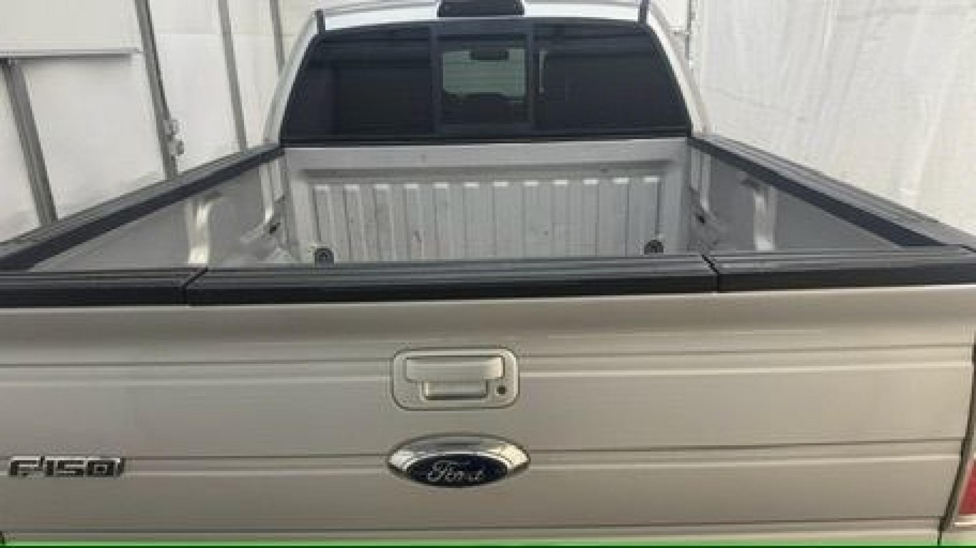 2014 Silver Ford F-150 LARIAT (1FTFW1CT0EK) with an 3.5L V6 TURBO engine, 6-Speed Automatic transmission, located at 1806 Veterans Memorial Hwy SW, Austell, GA, 30168, (770) 944-9558, 33.817959, -84.606987- Photo#10