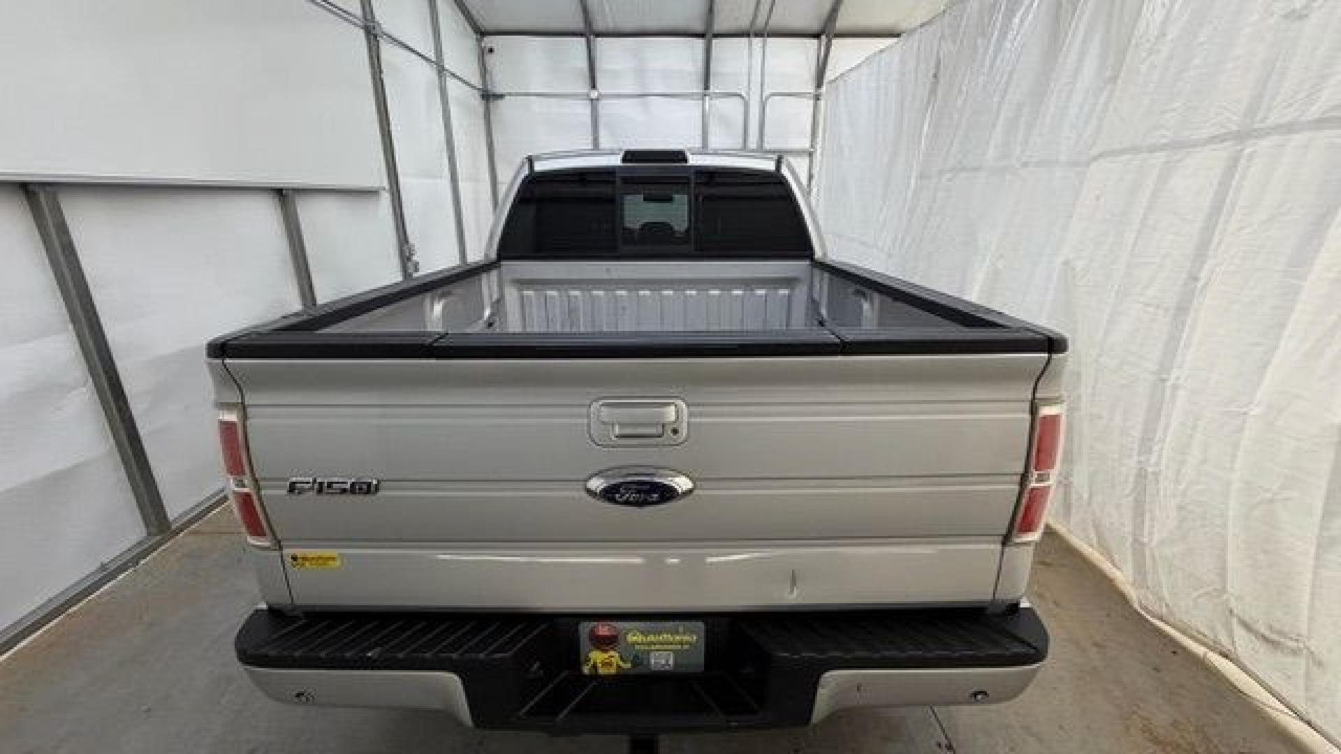 2014 Silver Ford F-150 LARIAT (1FTFW1CT0EK) with an 3.5L V6 TURBO engine, 6-Speed Automatic transmission, located at 1806 Veterans Memorial Hwy SW, Austell, GA, 30168, (770) 944-9558, 33.817959, -84.606987- Photo#11