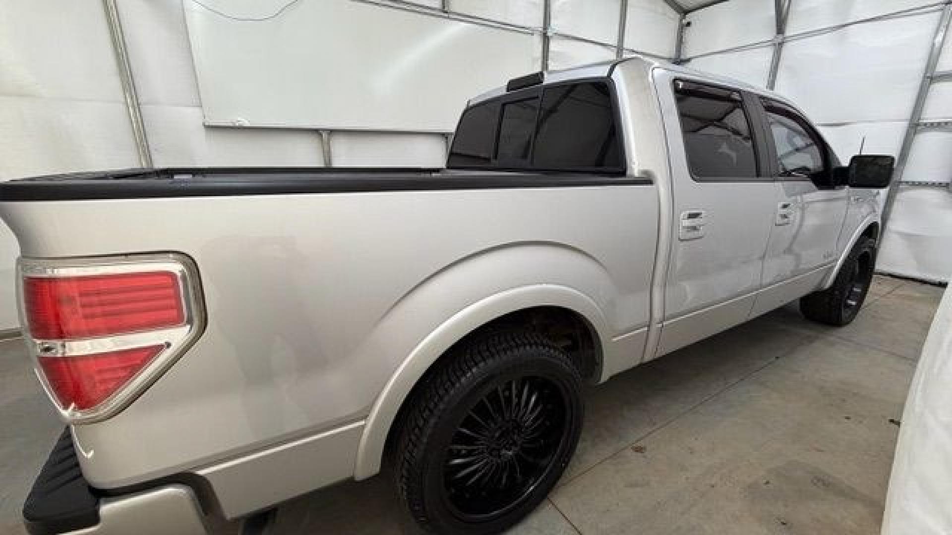 2014 Silver Ford F-150 LARIAT (1FTFW1CT0EK) with an 3.5L V6 TURBO engine, 6-Speed Automatic transmission, located at 1806 Veterans Memorial Hwy SW, Austell, GA, 30168, (770) 944-9558, 33.817959, -84.606987- Photo#13