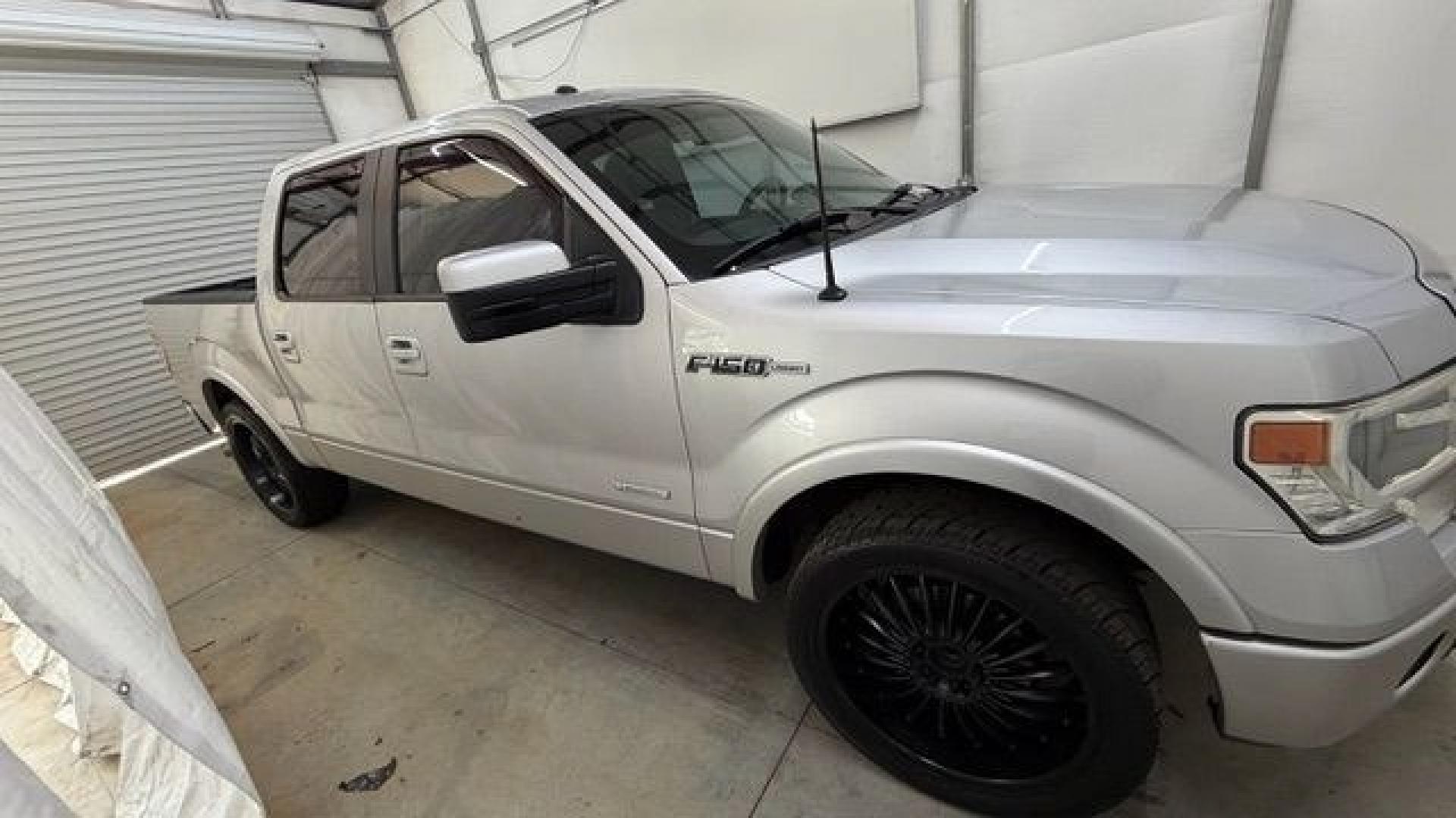 2014 Silver Ford F-150 LARIAT (1FTFW1CT0EK) with an 3.5L V6 TURBO engine, 6-Speed Automatic transmission, located at 1806 Veterans Memorial Hwy SW, Austell, GA, 30168, (770) 944-9558, 33.817959, -84.606987- Photo#18