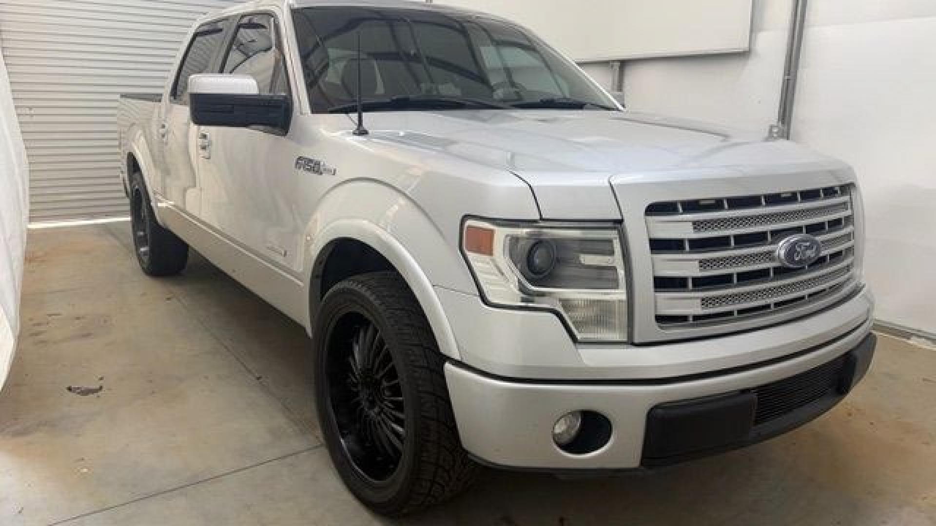 2014 Silver Ford F-150 LARIAT (1FTFW1CT0EK) with an 3.5L V6 TURBO engine, 6-Speed Automatic transmission, located at 1806 Veterans Memorial Hwy SW, Austell, GA, 30168, (770) 944-9558, 33.817959, -84.606987- Photo#19