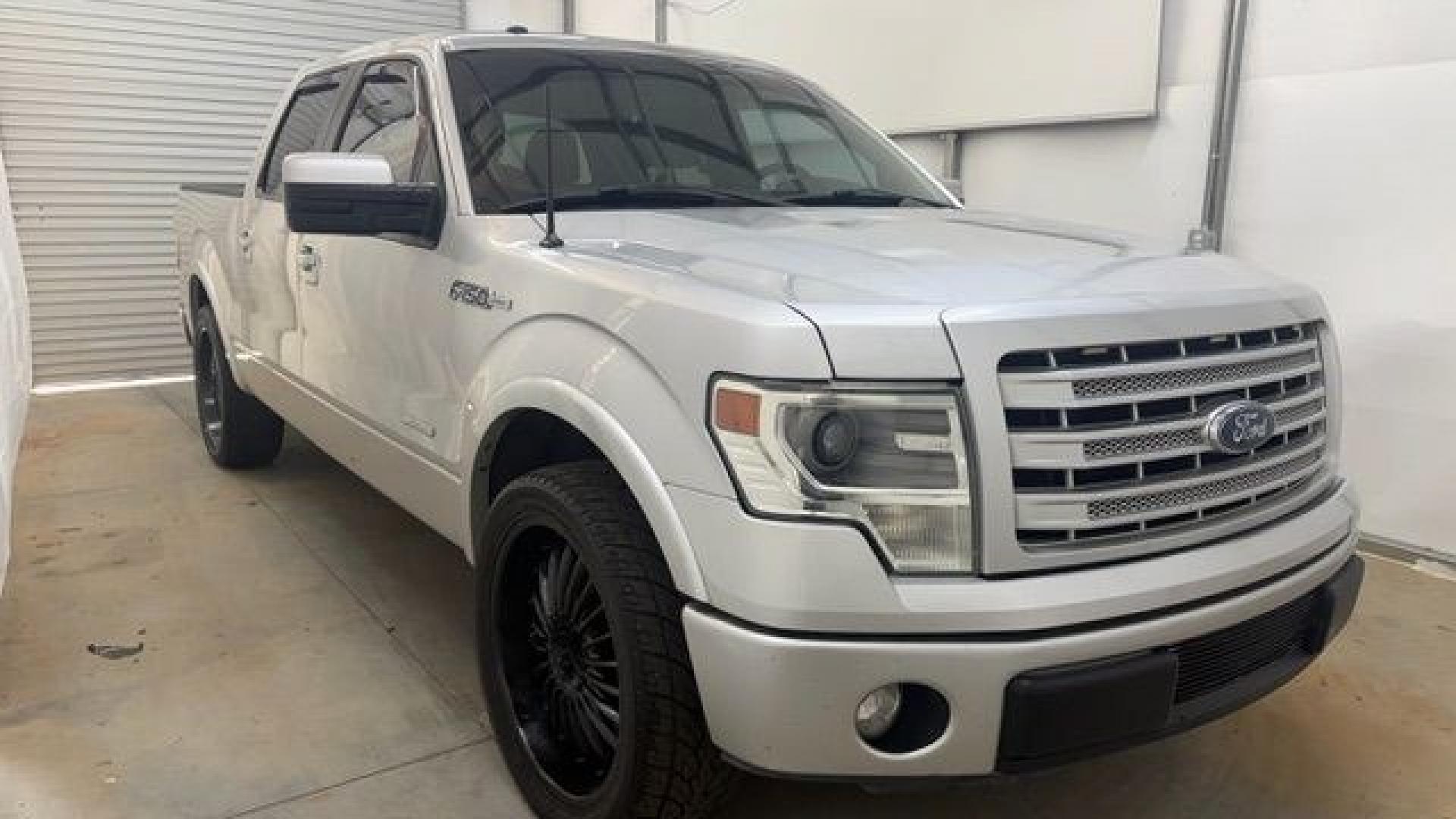 2014 Silver Ford F-150 LARIAT (1FTFW1CT0EK) with an 3.5L V6 TURBO engine, 6-Speed Automatic transmission, located at 1806 Veterans Memorial Hwy SW, Austell, GA, 30168, (770) 944-9558, 33.817959, -84.606987- Photo#20