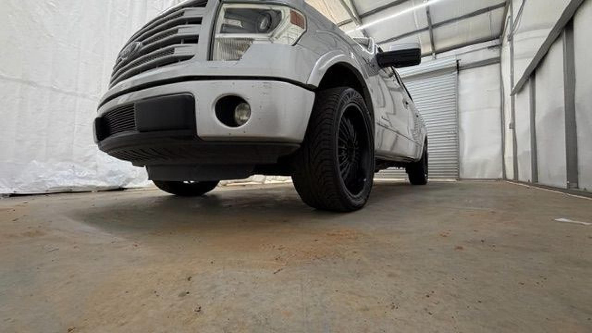 2014 Silver Ford F-150 LARIAT (1FTFW1CT0EK) with an 3.5L V6 TURBO engine, 6-Speed Automatic transmission, located at 1806 Veterans Memorial Hwy SW, Austell, GA, 30168, (770) 944-9558, 33.817959, -84.606987- Photo#23