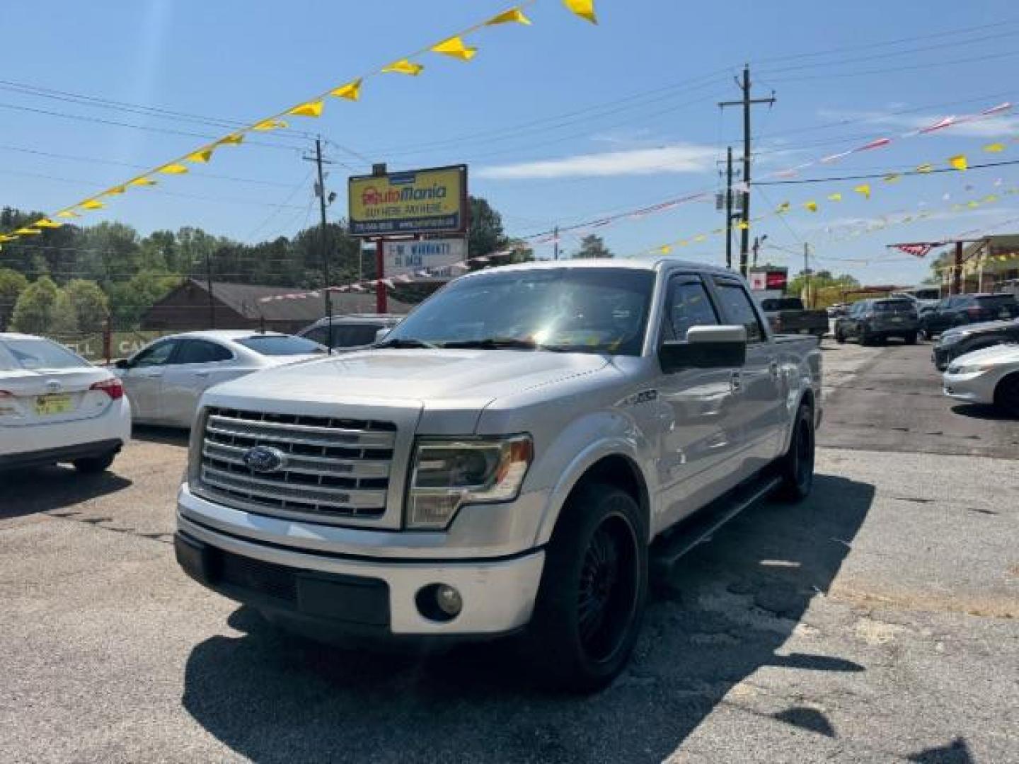 2014 Silver Ford F-150 LARIAT (1FTFW1CT0EK) with an 3.5L V6 TURBO engine, 6-Speed Automatic transmission, located at 1806 Veterans Memorial Hwy SW, Austell, GA, 30168, (770) 944-9558, 33.817959, -84.606987 - Photo#0