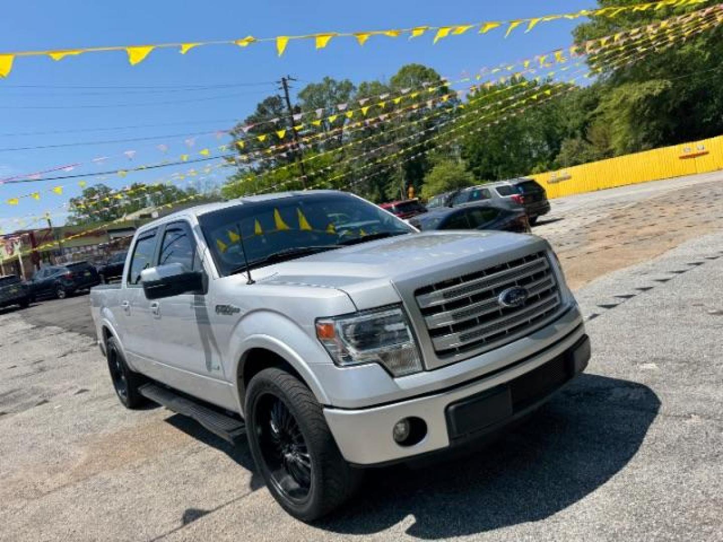 2014 Silver Ford F-150 LARIAT (1FTFW1CT0EK) with an 3.5L V6 TURBO engine, 6-Speed Automatic transmission, located at 1806 Veterans Memorial Hwy SW, Austell, GA, 30168, (770) 944-9558, 33.817959, -84.606987 - Photo#2