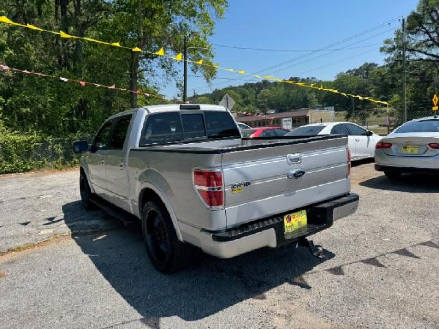 2014 Silver Ford F-150 LARIAT (1FTFW1CT0EK) with an 3.5L V6 TURBO engine, 6-Speed Automatic transmission, located at 1806 Veterans Memorial Hwy SW, Austell, GA, 30168, (770) 944-9558, 33.817959, -84.606987 - Photo#5