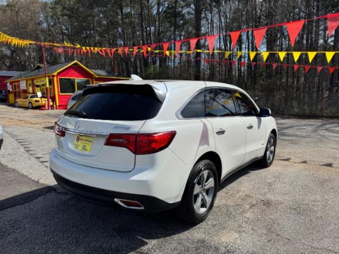 2014 White Acura MDX 6-Spd AT (5FRYD3H22EB) with an 3.5L V6 SOHC 24V engine, 6-Speed Automatic transmission, located at 1806 Veterans Memorial Hwy SW, Austell, GA, 30168, (770) 944-9558, 33.817959, -84.606987 - Photo#3