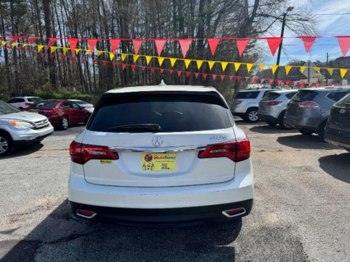 2014 White Acura MDX 6-Spd AT (5FRYD3H22EB) with an 3.5L V6 SOHC 24V engine, 6-Speed Automatic transmission, located at 1806 Veterans Memorial Hwy SW, Austell, GA, 30168, (770) 944-9558, 33.817959, -84.606987 - Photo#4