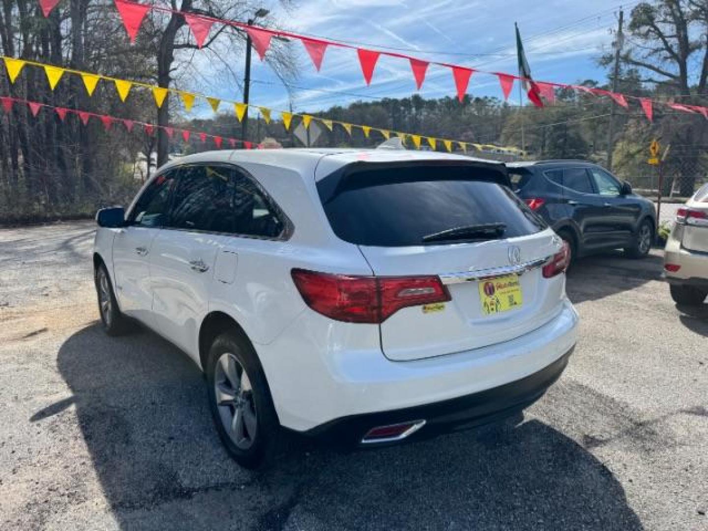 2014 White Acura MDX 6-Spd AT (5FRYD3H22EB) with an 3.5L V6 SOHC 24V engine, 6-Speed Automatic transmission, located at 1806 Veterans Memorial Hwy SW, Austell, GA, 30168, (770) 944-9558, 33.817959, -84.606987 - Photo#5
