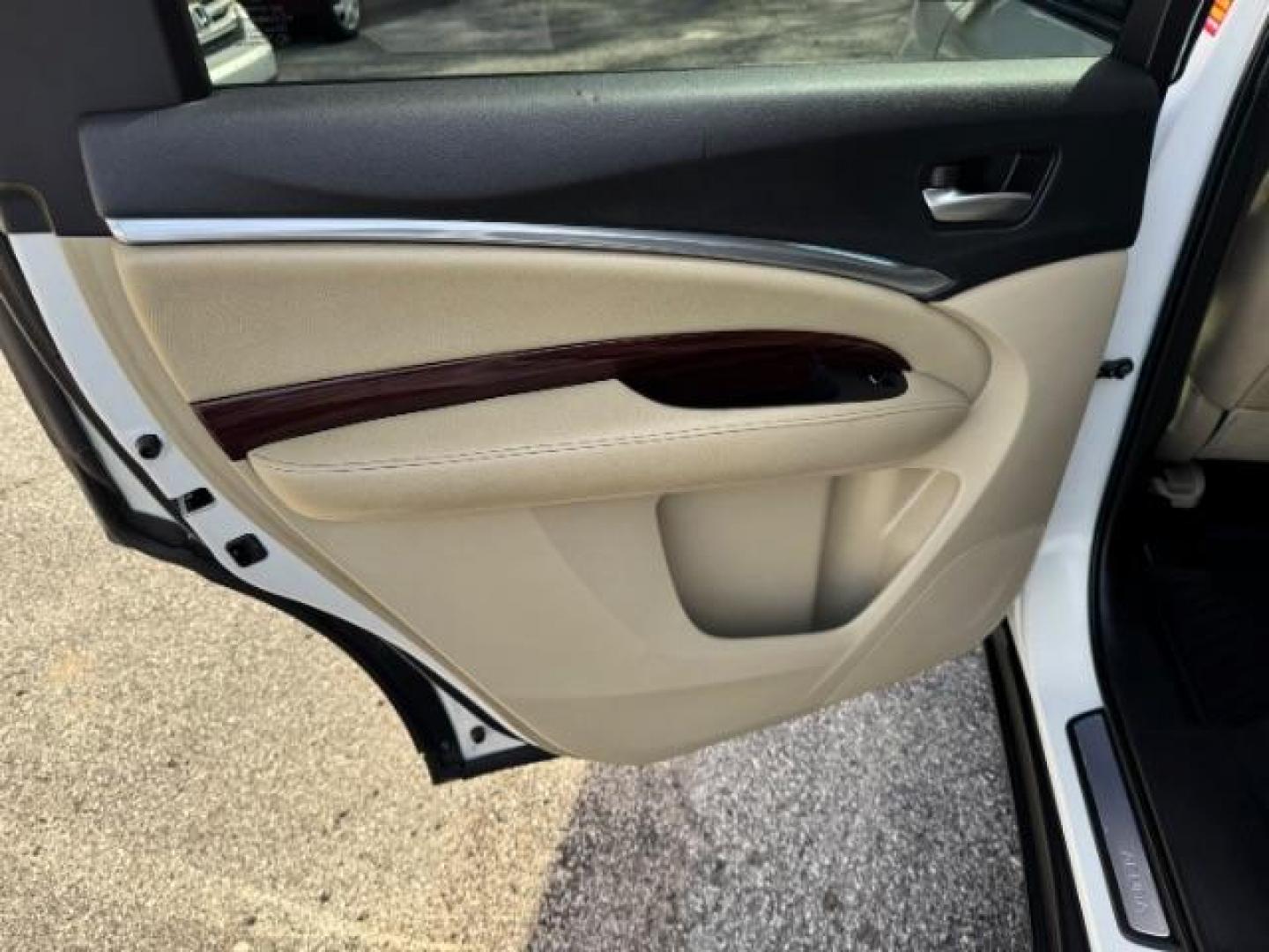 2014 White Acura MDX 6-Spd AT (5FRYD3H22EB) with an 3.5L V6 SOHC 24V engine, 6-Speed Automatic transmission, located at 1806 Veterans Memorial Hwy SW, Austell, GA, 30168, (770) 944-9558, 33.817959, -84.606987 - Photo#9