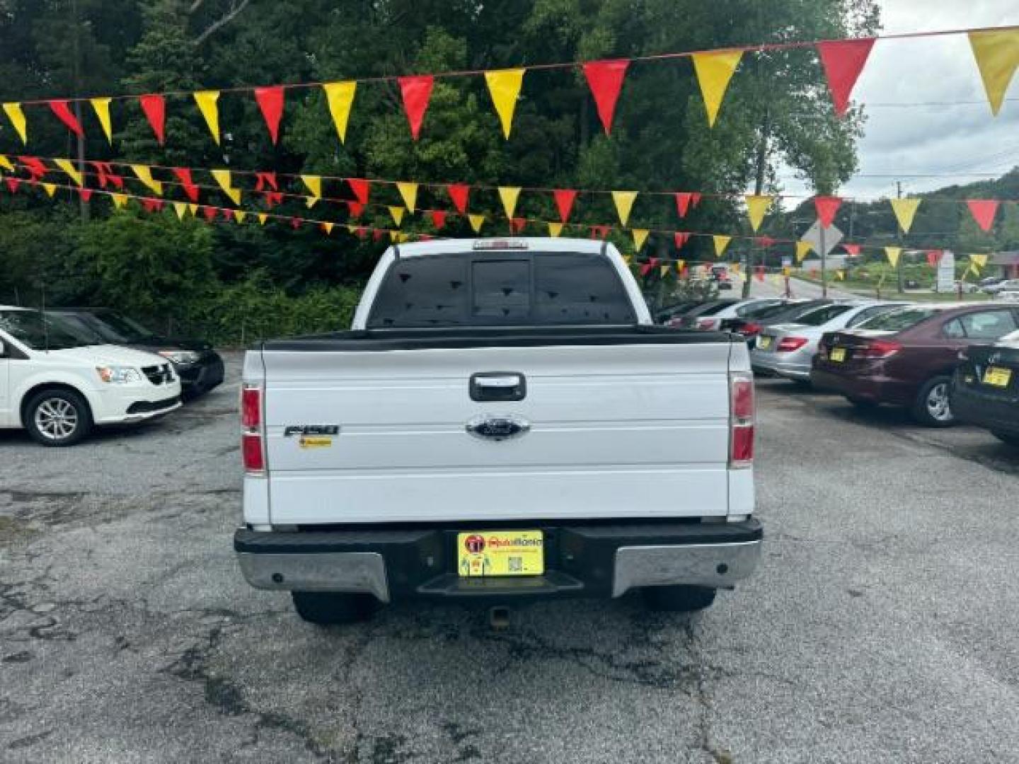 2011 White Ford F-150 XLT SuperCrew 5.5-ft (1FTFW1ET1BF) with an 3.5L V6 TURBO engine, 6-Speed Automatic transmission, located at 1806 Veterans Memorial Hwy SW, Austell, GA, 30168, (770) 944-9558, 33.817959, -84.606987 - Photo#4