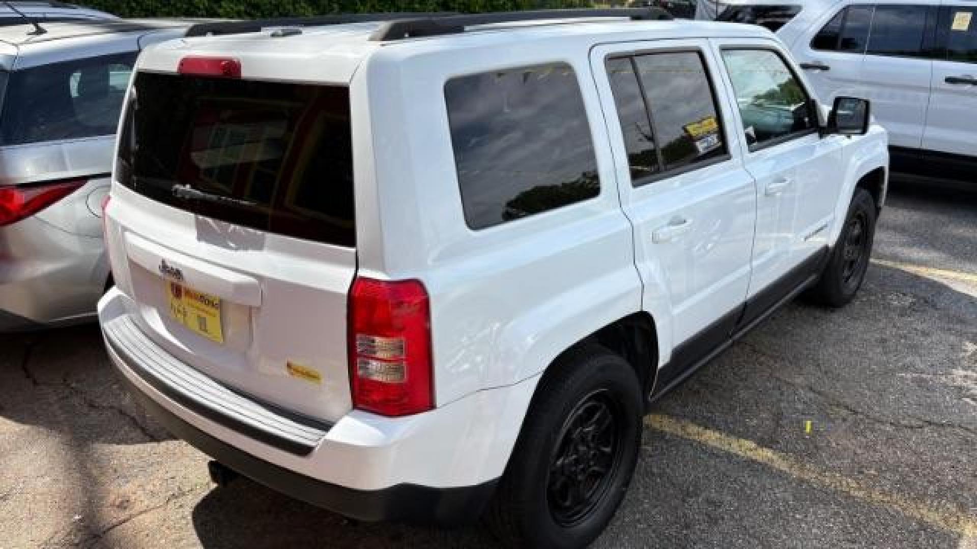 2016 White Jeep Patriot Sport 2WD (1C4NJPBAXGD) with an 2.0L L4 DOHC 16V engine, Continuously Variable Transmission transmission, located at 1806 Veterans Memorial Hwy SW, Austell, GA, 30168, (770) 944-9558, 33.817959, -84.606987 - Photo#2