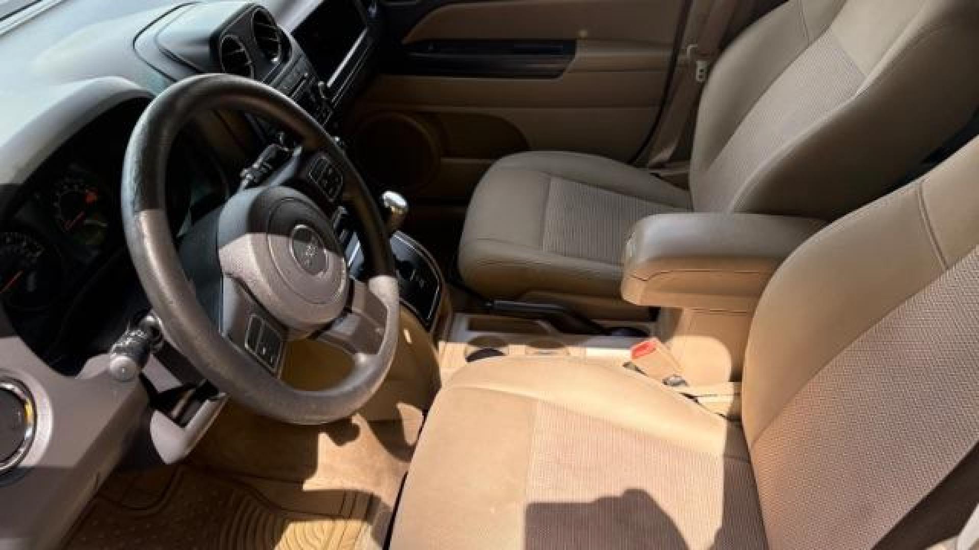 2016 White Jeep Patriot Sport 2WD (1C4NJPBAXGD) with an 2.0L L4 DOHC 16V engine, Continuously Variable Transmission transmission, located at 1806 Veterans Memorial Hwy SW, Austell, GA, 30168, (770) 944-9558, 33.817959, -84.606987 - Photo#6