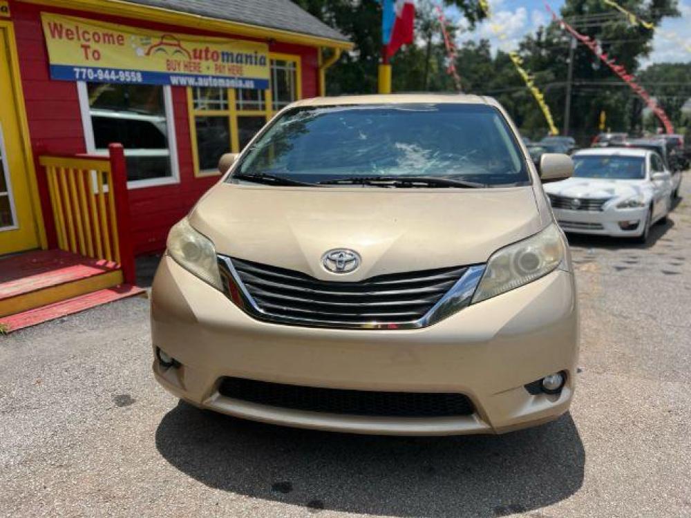 2011 Gold Toyota Sienna XLE 8-Pass V6 (5TDYK3DC9BS) with an 3.5L V6 EFI DOHC 24V engine, 5-Speed Automatic transmission, located at 1806 Veterans Memorial Hwy SW, Austell, GA, 30168, (770) 944-9558, 33.817959, -84.606987 - Photo #1