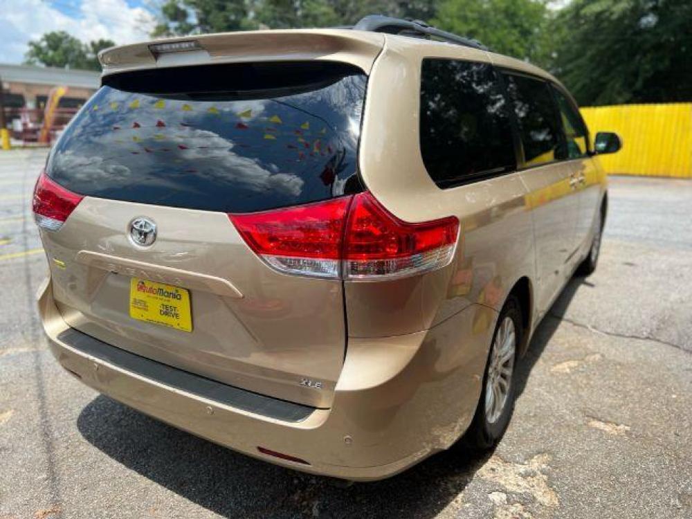 2011 Gold Toyota Sienna XLE 8-Pass V6 (5TDYK3DC9BS) with an 3.5L V6 EFI DOHC 24V engine, 5-Speed Automatic transmission, located at 1806 Veterans Memorial Hwy SW, Austell, GA, 30168, (770) 944-9558, 33.817959, -84.606987 - Photo #3