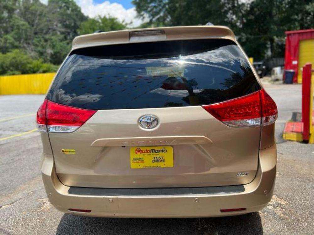 2011 Gold Toyota Sienna XLE 8-Pass V6 (5TDYK3DC9BS) with an 3.5L V6 EFI DOHC 24V engine, 5-Speed Automatic transmission, located at 1806 Veterans Memorial Hwy SW, Austell, GA, 30168, (770) 944-9558, 33.817959, -84.606987 - Photo #4