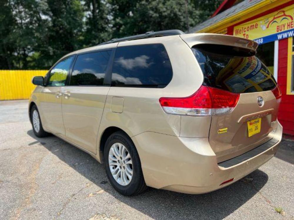 2011 Gold Toyota Sienna XLE 8-Pass V6 (5TDYK3DC9BS) with an 3.5L V6 EFI DOHC 24V engine, 5-Speed Automatic transmission, located at 1806 Veterans Memorial Hwy SW, Austell, GA, 30168, (770) 944-9558, 33.817959, -84.606987 - Photo #5