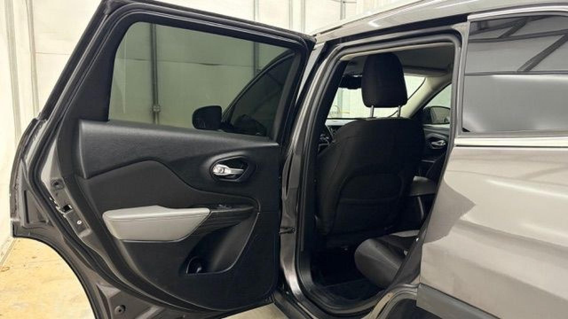 2014 Gray Jeep Cherokee Latitude FWD (1C4PJLCB4EW) with an 2.4L L4 DOHC 16V engine, 9-Speed Automatic transmission, located at 1806 Veterans Memorial Hwy SW, Austell, GA, 30168, (770) 944-9558, 33.817959, -84.606987- Photo#25