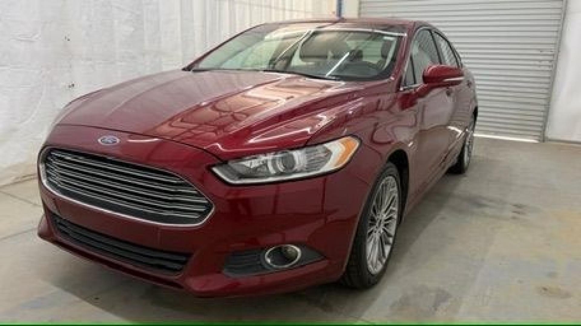 2013 Red Ford Fusion SE (3FA6P0H95DR) with an 2.0L L4 DOHC 16V engine, located at 1806 Veterans Memorial Hwy SW, Austell, GA, 30168, (770) 944-9558, 33.817959, -84.606987- Photo#0