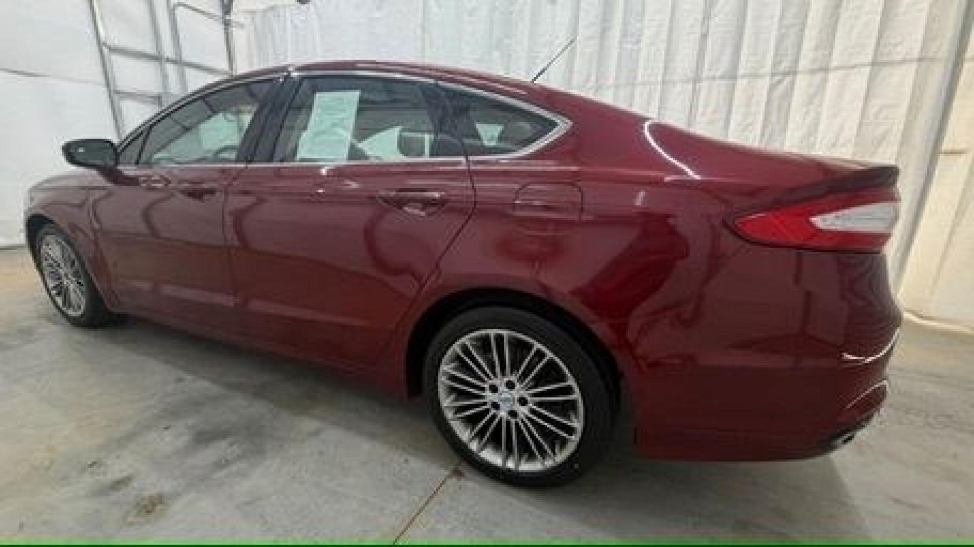 2013 Red Ford Fusion SE (3FA6P0H95DR) with an 2.0L L4 DOHC 16V engine, located at 1806 Veterans Memorial Hwy SW, Austell, GA, 30168, (770) 944-9558, 33.817959, -84.606987- Photo#2