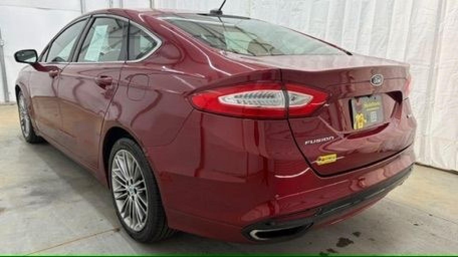 2013 Red Ford Fusion SE (3FA6P0H95DR) with an 2.0L L4 DOHC 16V engine, located at 1806 Veterans Memorial Hwy SW, Austell, GA, 30168, (770) 944-9558, 33.817959, -84.606987- Photo#3
