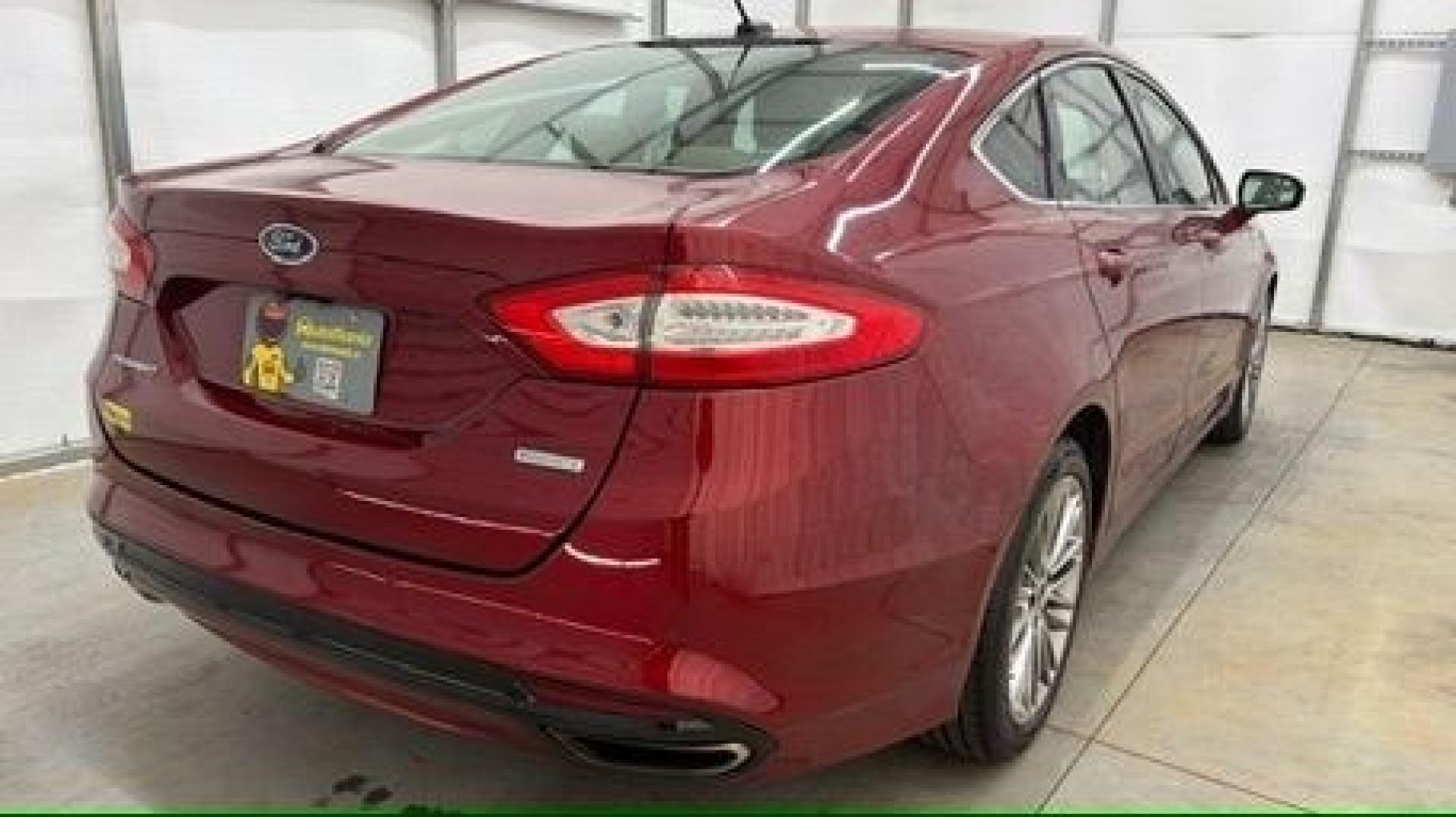 2013 Red Ford Fusion SE (3FA6P0H95DR) with an 2.0L L4 DOHC 16V engine, located at 1806 Veterans Memorial Hwy SW, Austell, GA, 30168, (770) 944-9558, 33.817959, -84.606987- Photo#5