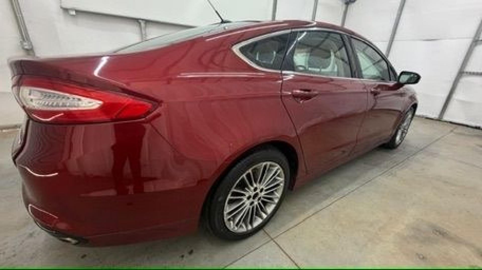 2013 Red Ford Fusion SE (3FA6P0H95DR) with an 2.0L L4 DOHC 16V engine, located at 1806 Veterans Memorial Hwy SW, Austell, GA, 30168, (770) 944-9558, 33.817959, -84.606987- Photo#6