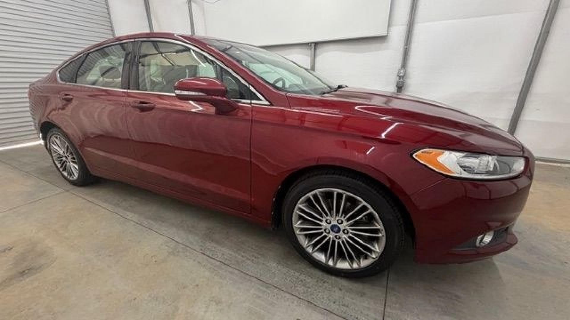2013 Red Ford Fusion SE (3FA6P0H95DR) with an 2.0L L4 DOHC 16V engine, located at 1806 Veterans Memorial Hwy SW, Austell, GA, 30168, (770) 944-9558, 33.817959, -84.606987- Photo#7
