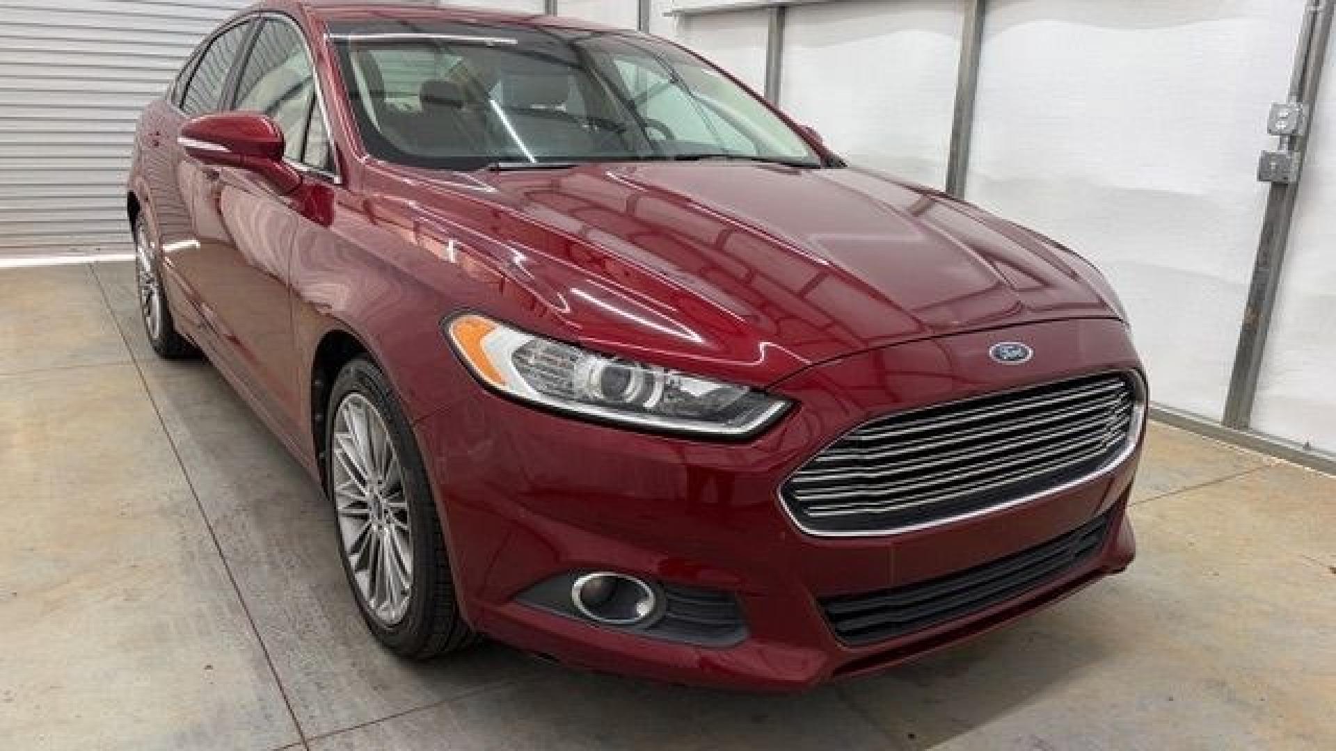 2013 Red Ford Fusion SE (3FA6P0H95DR) with an 2.0L L4 DOHC 16V engine, located at 1806 Veterans Memorial Hwy SW, Austell, GA, 30168, (770) 944-9558, 33.817959, -84.606987- Photo#8