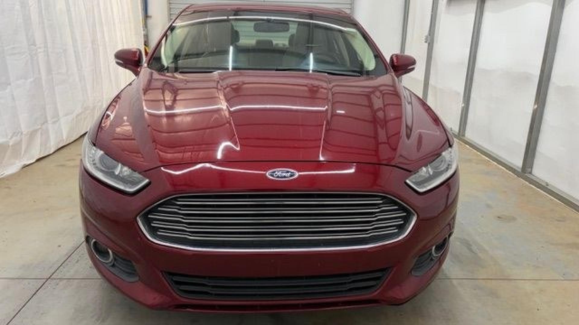 2013 Red Ford Fusion SE (3FA6P0H95DR) with an 2.0L L4 DOHC 16V engine, located at 1806 Veterans Memorial Hwy SW, Austell, GA, 30168, (770) 944-9558, 33.817959, -84.606987- Photo#9