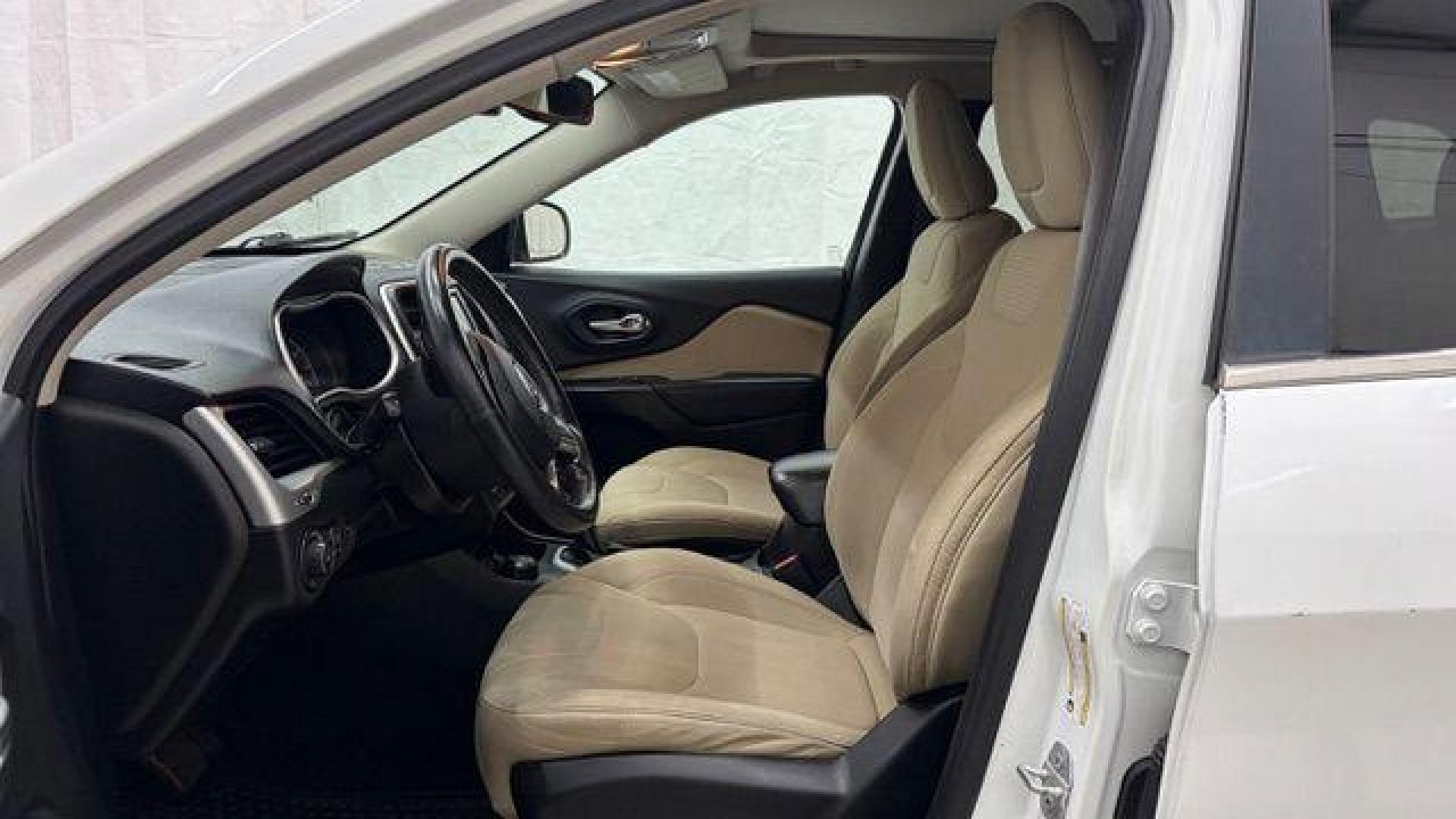 2015 White Jeep Cherokee Latitude 4WD (1C4PJMCS4FW) with an 3.2L V6 DOHC 24V engine, 9-Speed Automatic transmission, located at 1806 Veterans Memorial Hwy SW, Austell, GA, 30168, (770) 944-9558, 33.817959, -84.606987 - Photo#11