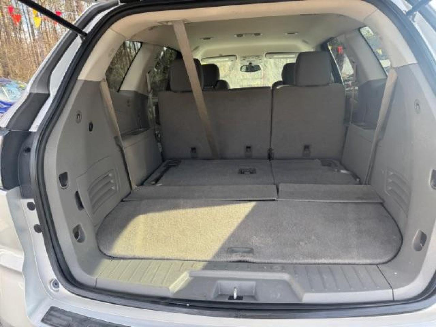 2015 Silver Chevrolet Traverse LS FWD w/PDC (1GNKRFED0FJ) with an 3.6L V6 DOHC 24V engine, 6-Speed Automatic transmission, located at 1806 Veterans Memorial Hwy SW, Austell, GA, 30168, (770) 944-9558, 33.817959, -84.606987 - Photo#16