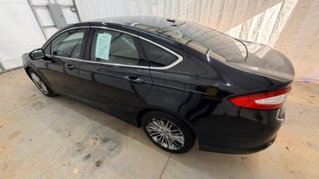2013 Black Ford Fusion SE (3FA6P0HR9DR) with an 1.6L L4 DOHC 16V engine, located at 1806 Veterans Memorial Hwy SW, Austell, GA, 30168, (770) 944-9558, 33.817959, -84.606987 - Photo#2