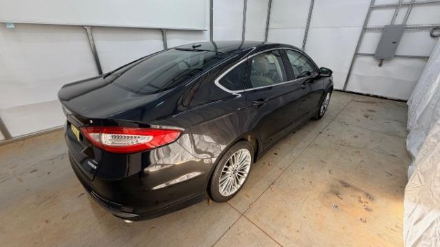 2013 Black Ford Fusion SE (3FA6P0HR9DR) with an 1.6L L4 DOHC 16V engine, located at 1806 Veterans Memorial Hwy SW, Austell, GA, 30168, (770) 944-9558, 33.817959, -84.606987 - Photo#6
