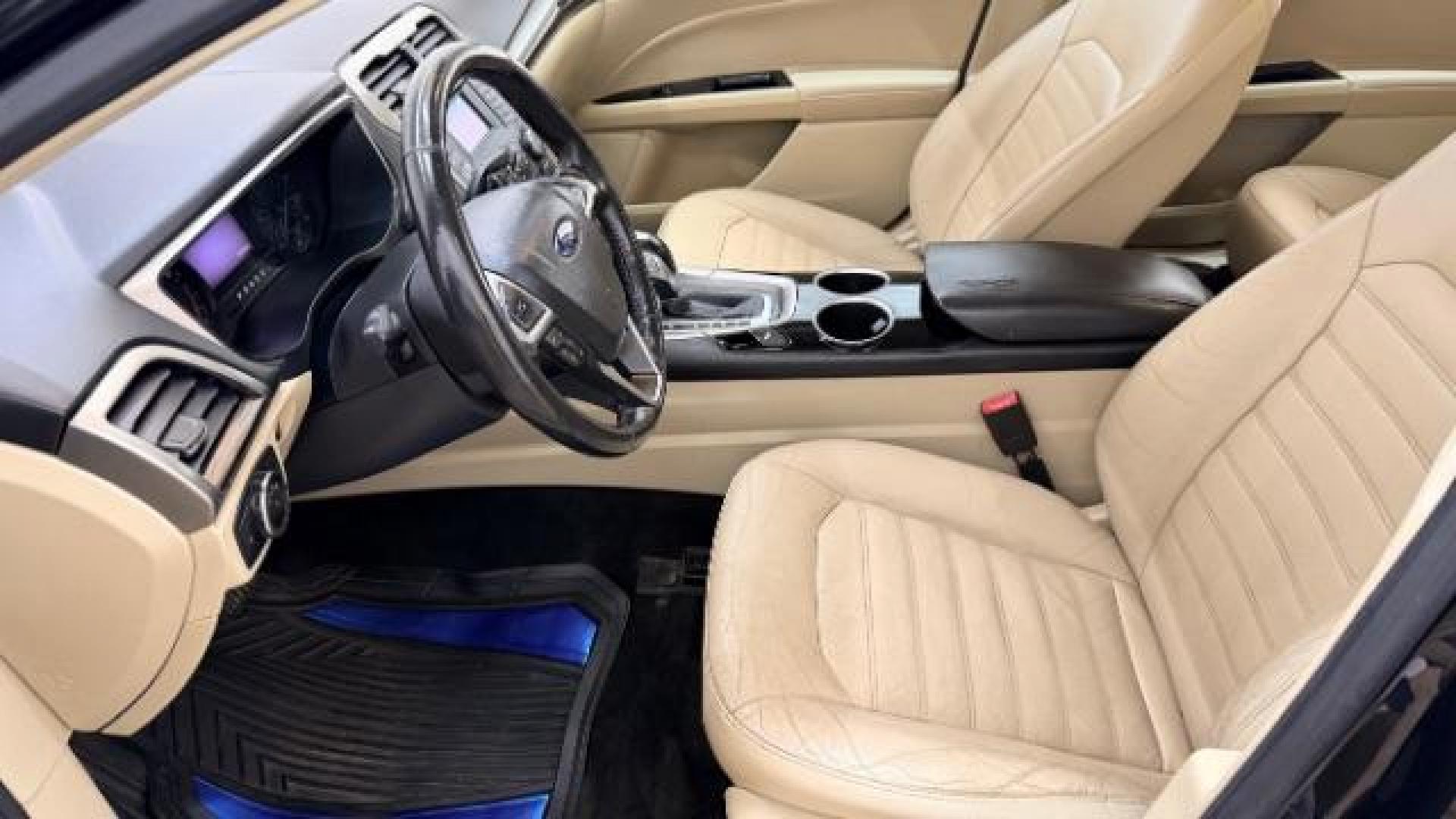 2013 Black Ford Fusion SE (3FA6P0HR9DR) with an 1.6L L4 DOHC 16V engine, located at 1806 Veterans Memorial Hwy SW, Austell, GA, 30168, (770) 944-9558, 33.817959, -84.606987 - Photo#12