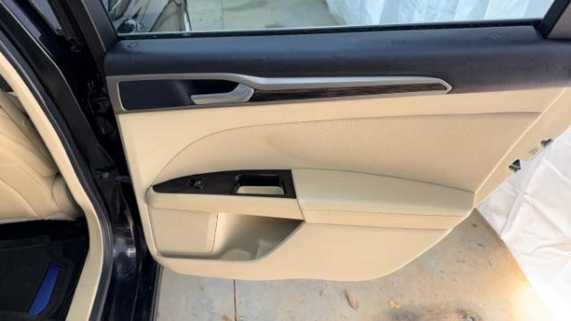 2013 Black Ford Fusion SE (3FA6P0HR9DR) with an 1.6L L4 DOHC 16V engine, located at 1806 Veterans Memorial Hwy SW, Austell, GA, 30168, (770) 944-9558, 33.817959, -84.606987 - Photo#16