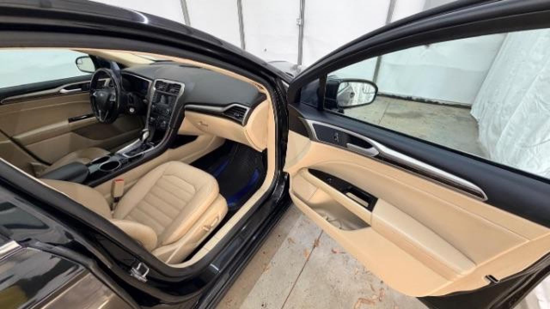 2013 Black Ford Fusion SE (3FA6P0HR9DR) with an 1.6L L4 DOHC 16V engine, located at 1806 Veterans Memorial Hwy SW, Austell, GA, 30168, (770) 944-9558, 33.817959, -84.606987 - Photo#19