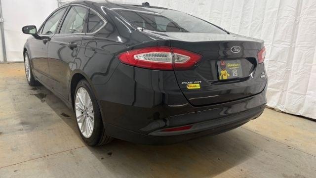 2013 Black Ford Fusion SE (3FA6P0HR9DR) with an 1.6L L4 DOHC 16V engine, located at 1806 Veterans Memorial Hwy SW, Austell, GA, 30168, (770) 944-9558, 33.817959, -84.606987 - Photo#2