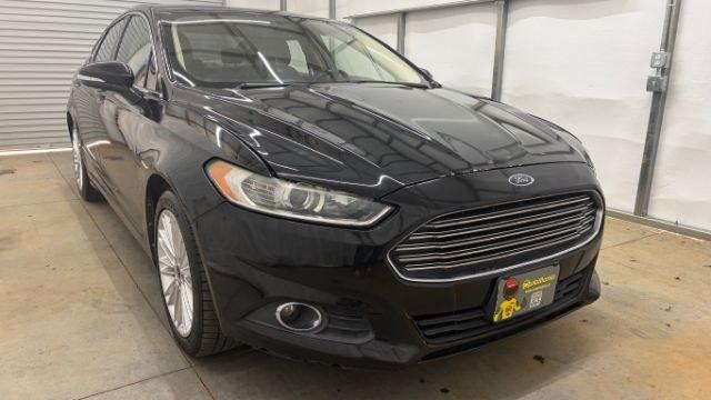 2013 Black Ford Fusion SE (3FA6P0HR9DR) with an 1.6L L4 DOHC 16V engine, located at 1806 Veterans Memorial Hwy SW, Austell, GA, 30168, (770) 944-9558, 33.817959, -84.606987 - Photo#6