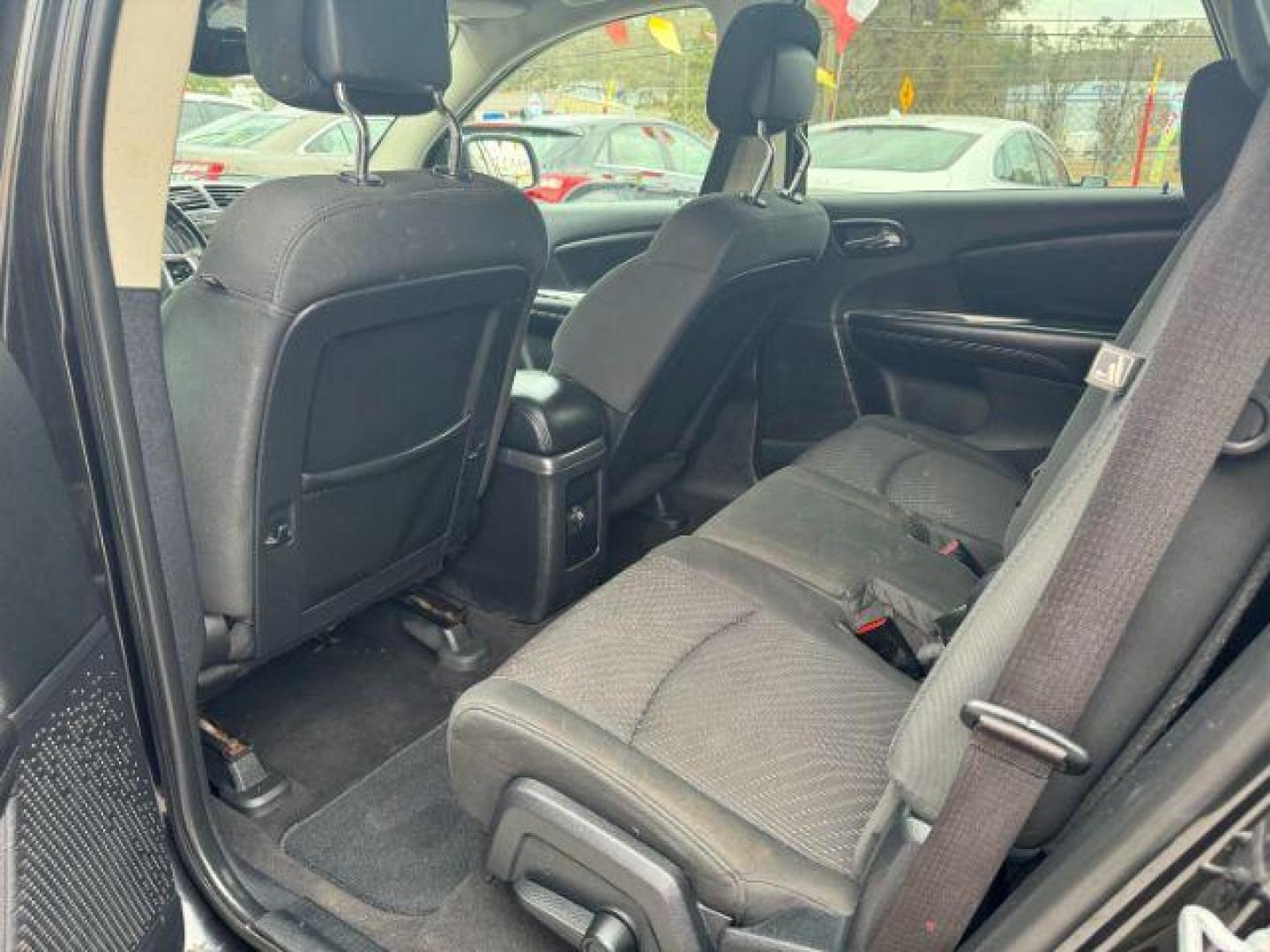 2012 black Dodge Journey SXT (3C4PDCBG1CT) with an 3.6L V6 DOHC 24V engine, 6-Speed Automatic transmission, located at 1806 Veterans Memorial Hwy SW, Austell, GA, 30168, (770) 944-9558, 33.817959, -84.606987 - Photo#9