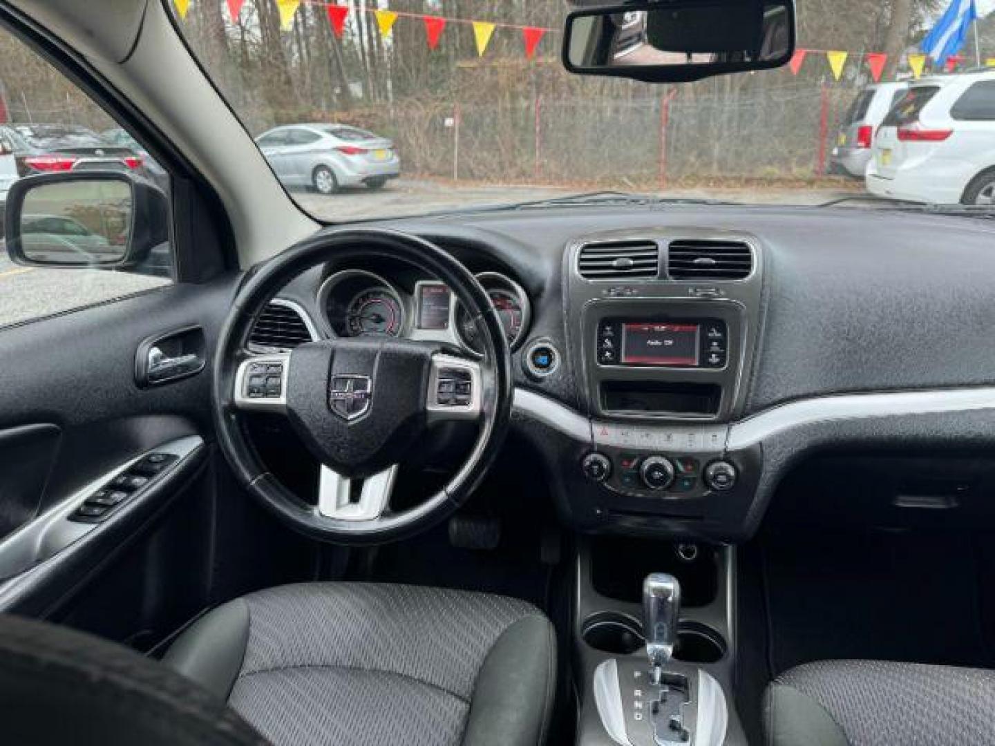 2012 black Dodge Journey SXT (3C4PDCBG1CT) with an 3.6L V6 DOHC 24V engine, 6-Speed Automatic transmission, located at 1806 Veterans Memorial Hwy SW, Austell, GA, 30168, (770) 944-9558, 33.817959, -84.606987 - Photo#11
