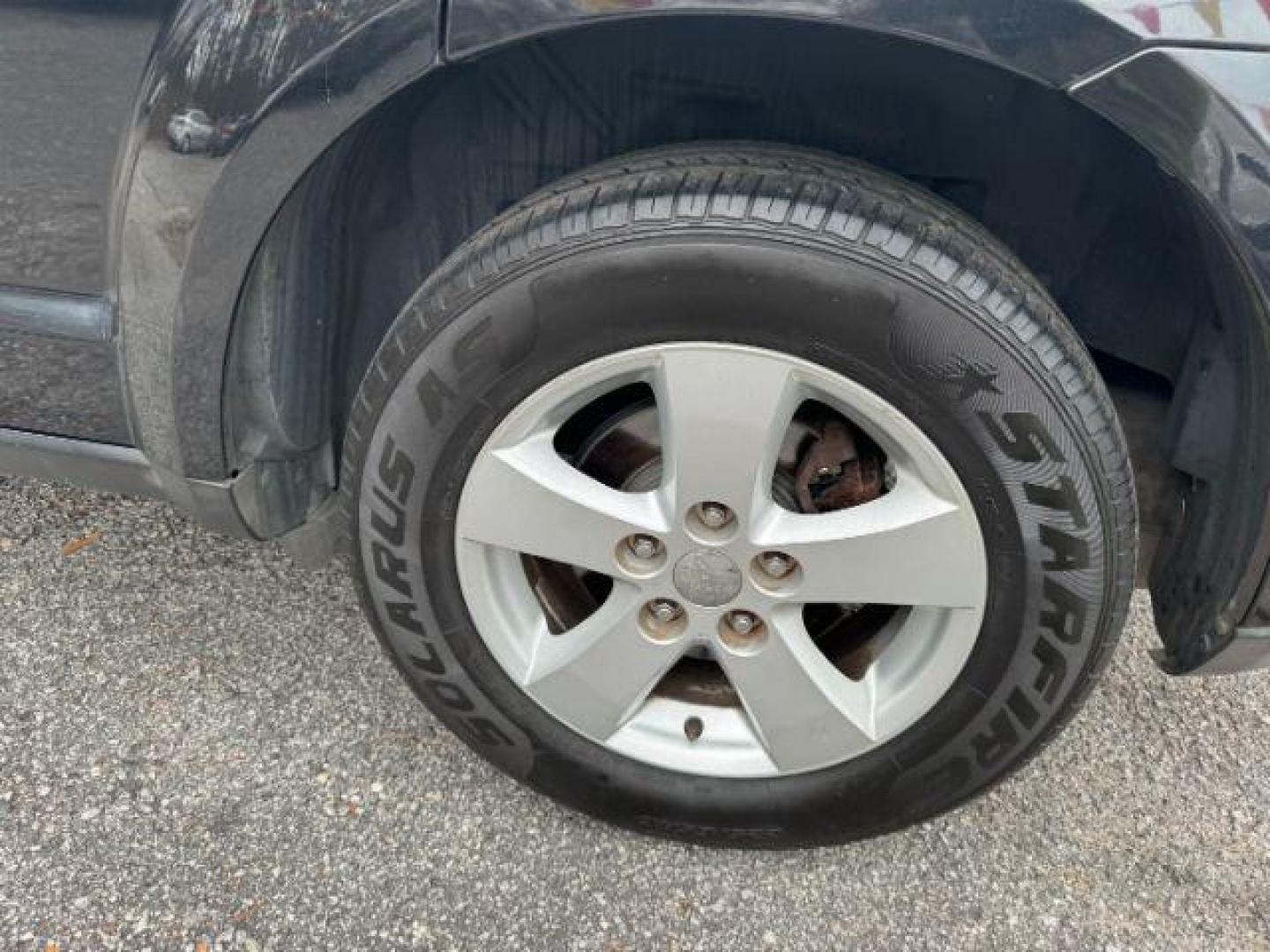 2012 black Dodge Journey SXT (3C4PDCBG1CT) with an 3.6L V6 DOHC 24V engine, 6-Speed Automatic transmission, located at 1806 Veterans Memorial Hwy SW, Austell, GA, 30168, (770) 944-9558, 33.817959, -84.606987 - Photo#22