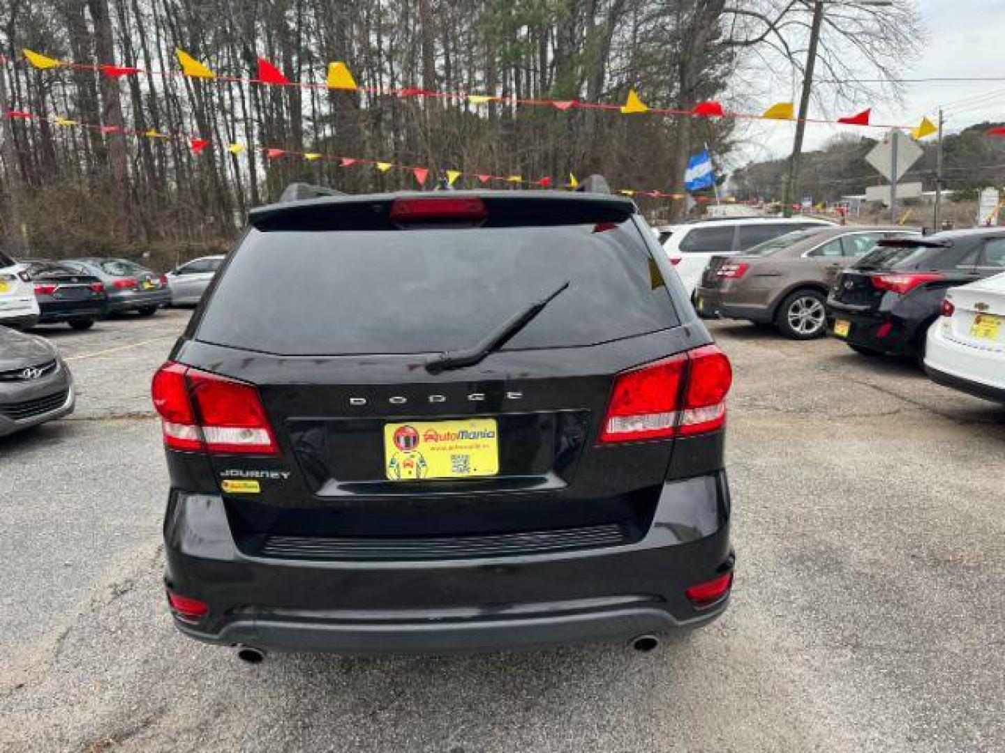 2012 black Dodge Journey SXT (3C4PDCBG1CT) with an 3.6L V6 DOHC 24V engine, 6-Speed Automatic transmission, located at 1806 Veterans Memorial Hwy SW, Austell, GA, 30168, (770) 944-9558, 33.817959, -84.606987 - Photo#3